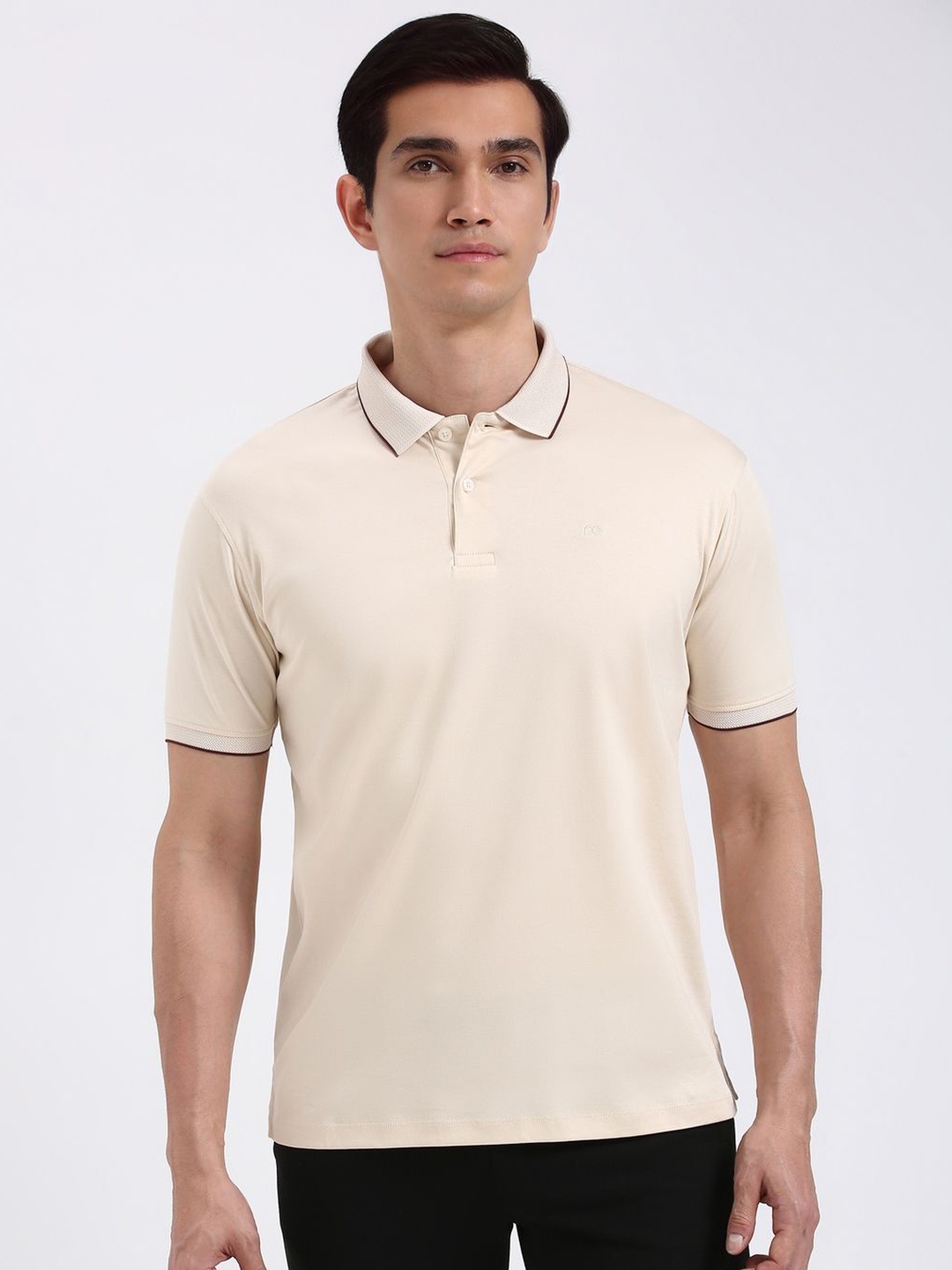 

Peter England Elite Men Solid Polo Collar Cotton T-shirt, Beige