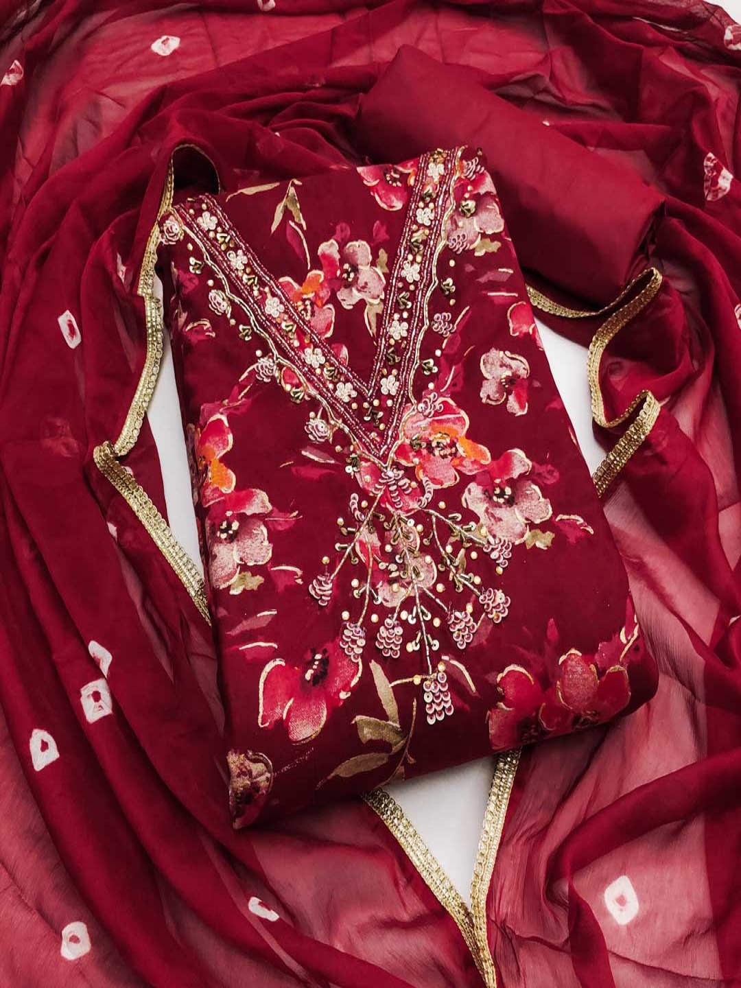 

Maroosh Printed Unstitched Dress Material, Maroon