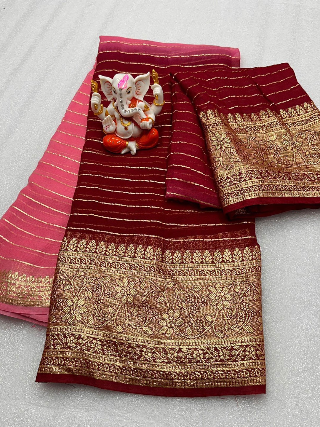 

PAYAL CREATION Striped Zari Pure Georgette Saree, Maroon