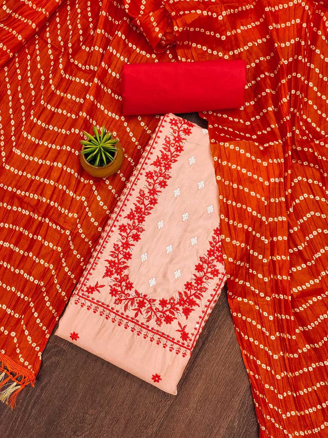 

Maroosh Floral Embroidered Sequinned Unstitched Dress Material, Peach