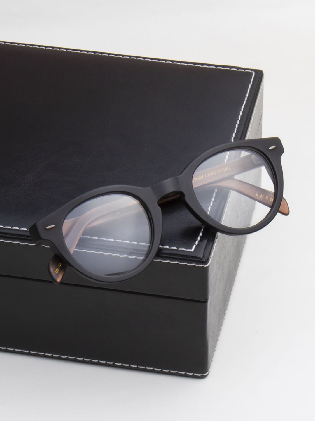 

Ted Smith Unisex Black Round Premium Acetate Frames