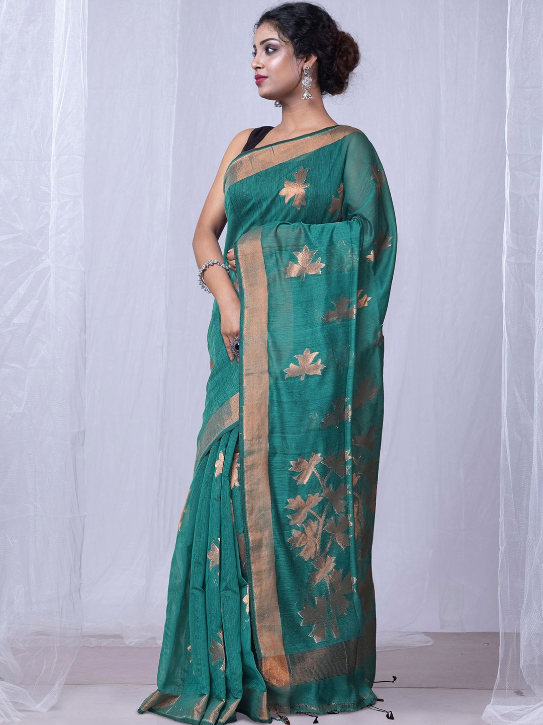 

Unnati Silks Ethnic Motifs Zari Handloom Saree, Green