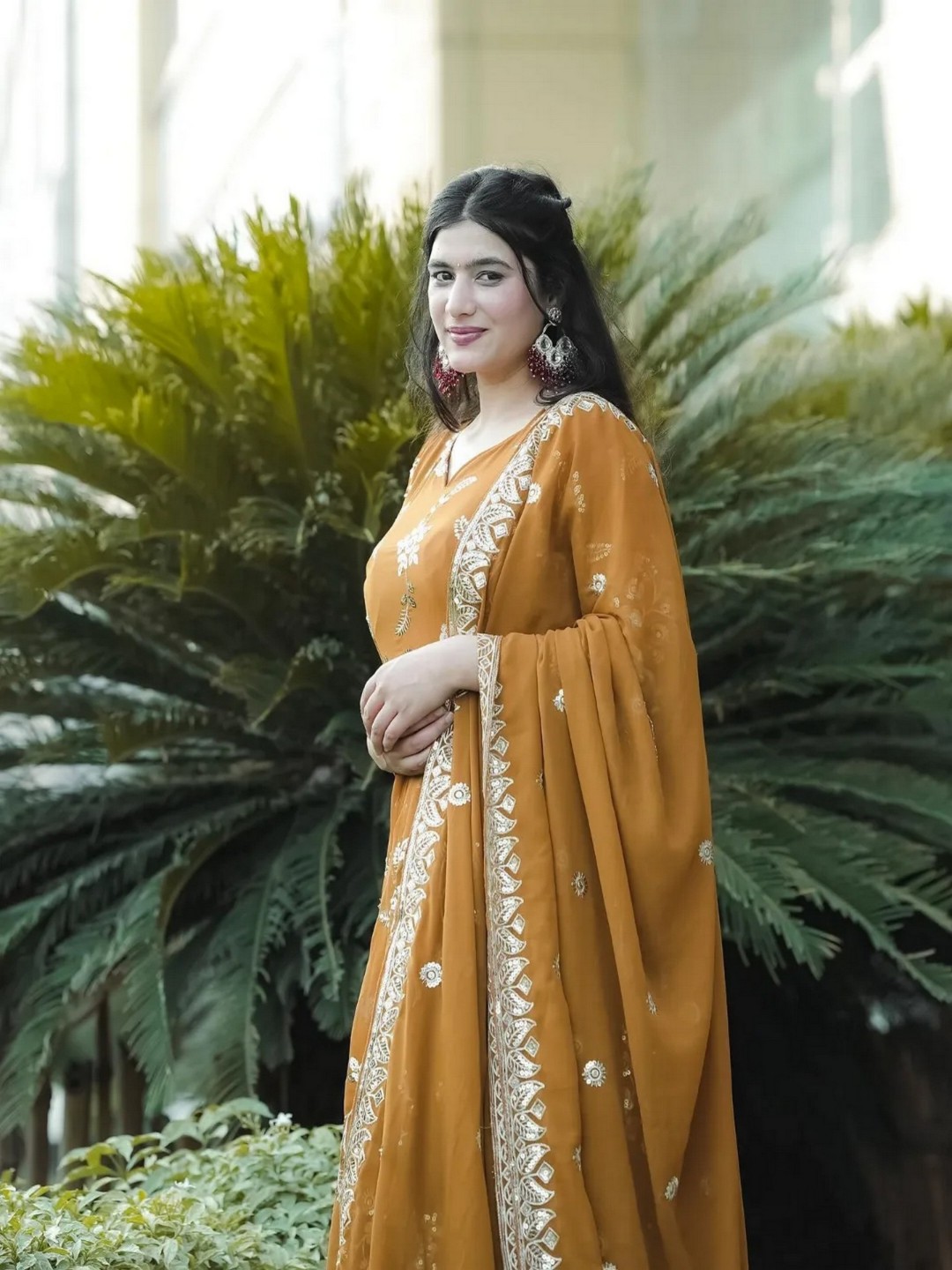 

ZEEPKART Sequinned Georgette Kurta with Trousers & Dupatta, Mustard
