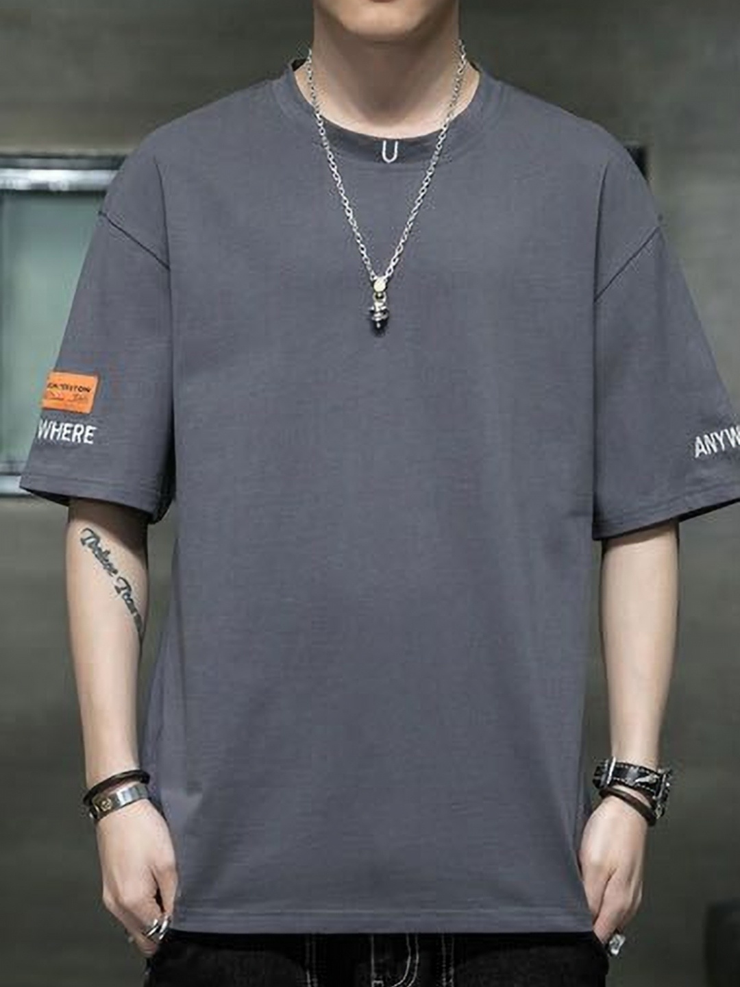 

StyleCast x Revolte Men Solid Round Neck Cotton Oversized T-shirt, Grey