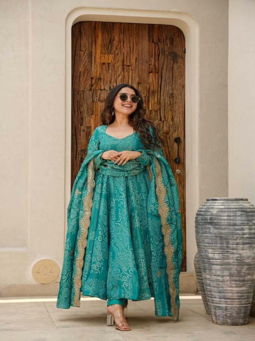 

ZEEPKART Women Ethnic Motifs Empire Kurta with Dhoti Pants & With Dupatta, Teal