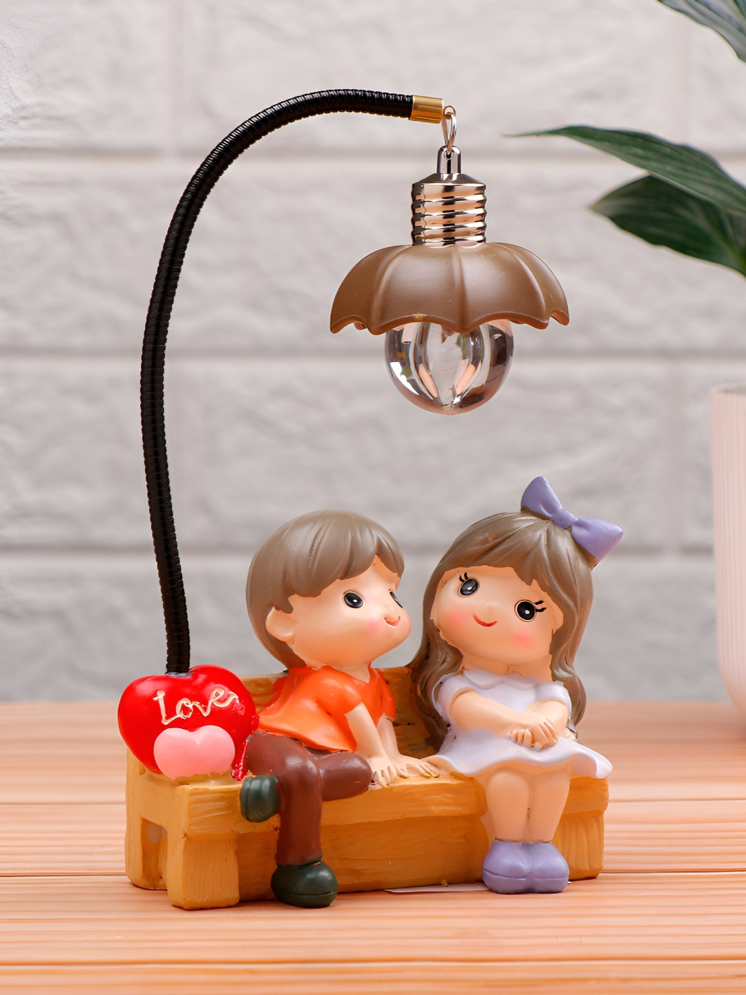 

Archies Orange And Red Lovely Couple Figurine Showpiece