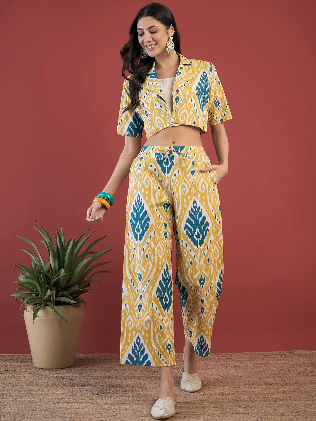 

Sangria Ethnic Motifs Printed Top Jacket With Trousers, Yellow