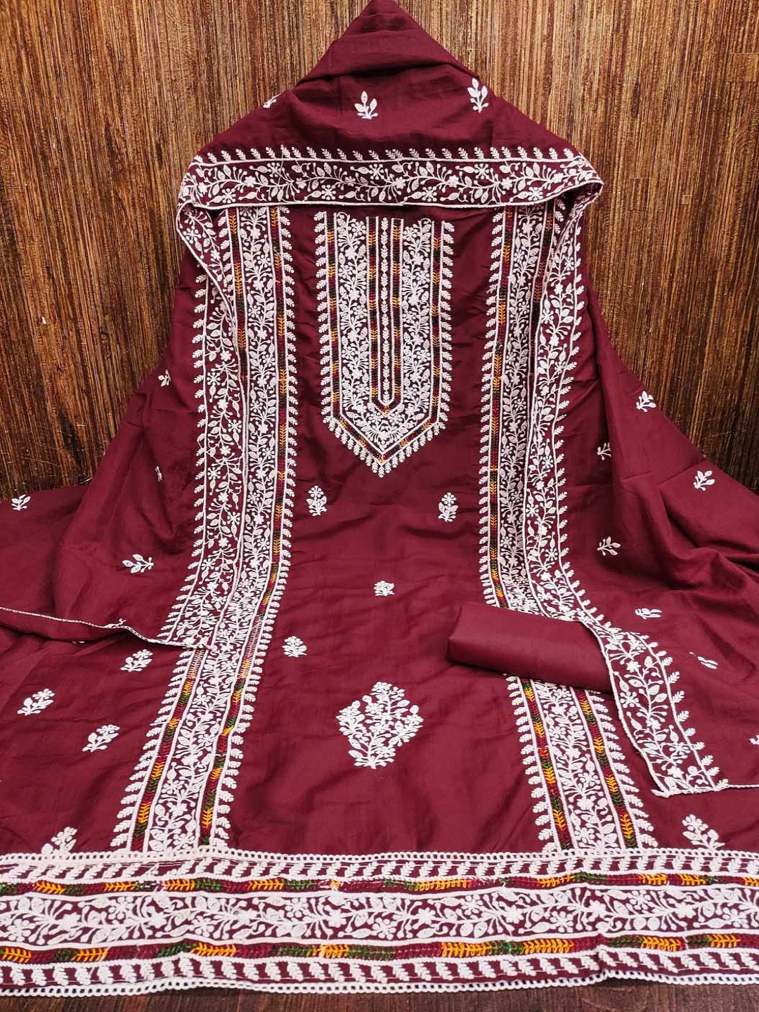 

Maroosh Floral Embroidered Thread Work Unstitched Dress Material, Maroon