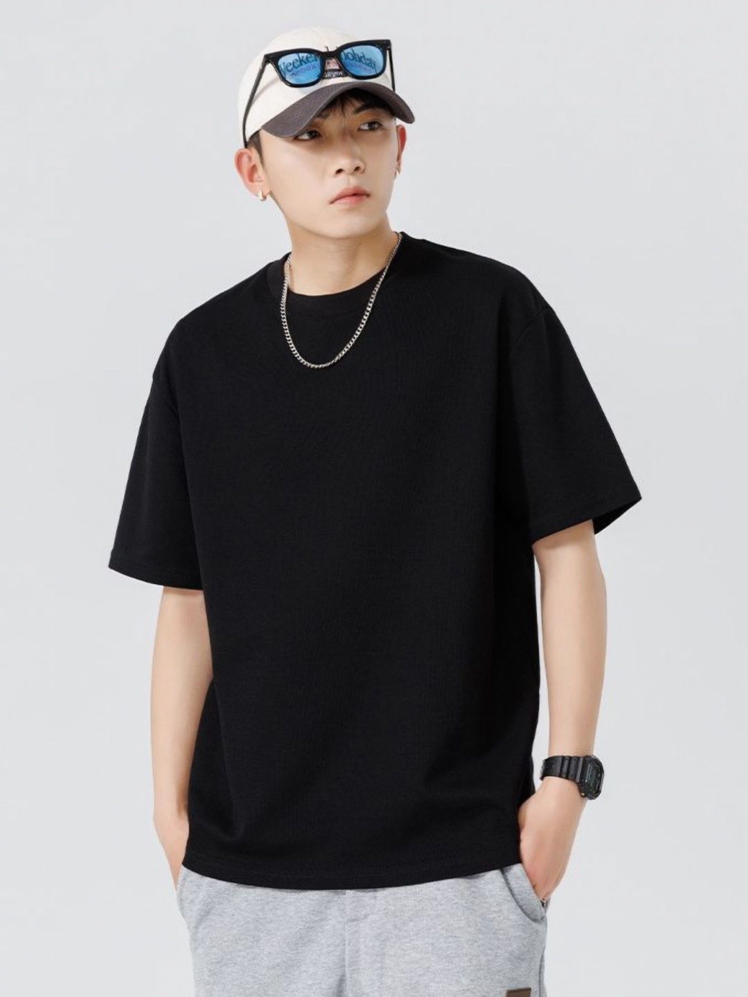 

StyleCast x Revolte Men Solid Round Neck Cotton Relaxed Fit T-shirt, Black