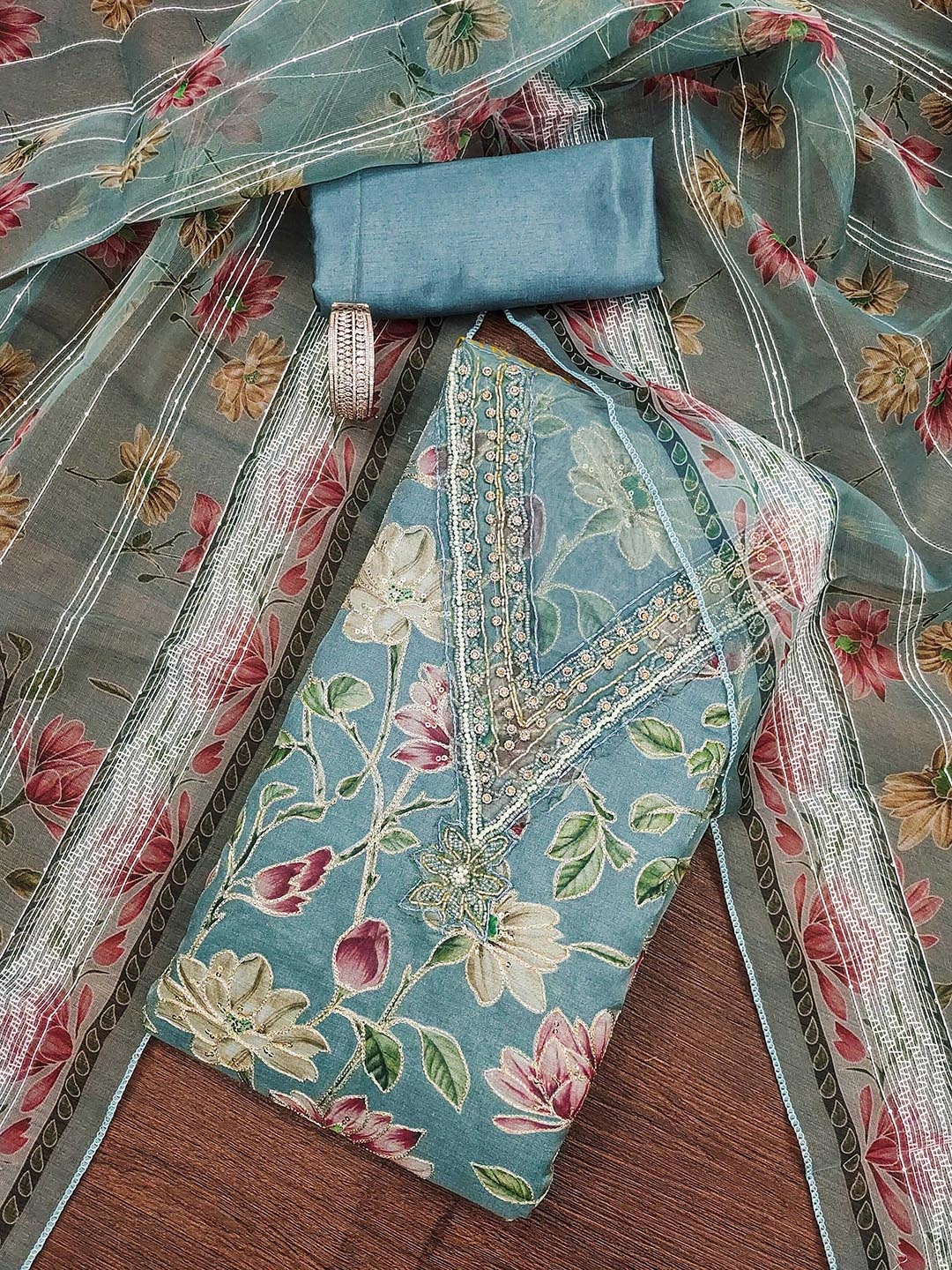 

Maroosh Floral Printed V Neck Stones And Beads Work Organza Unstitched Dress Material, Sea green