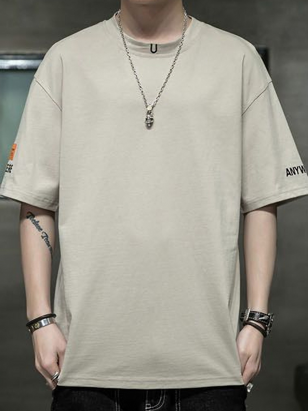 

StyleCast x Revolte Men Solid Round Neck Oversized T-shirt, Khaki