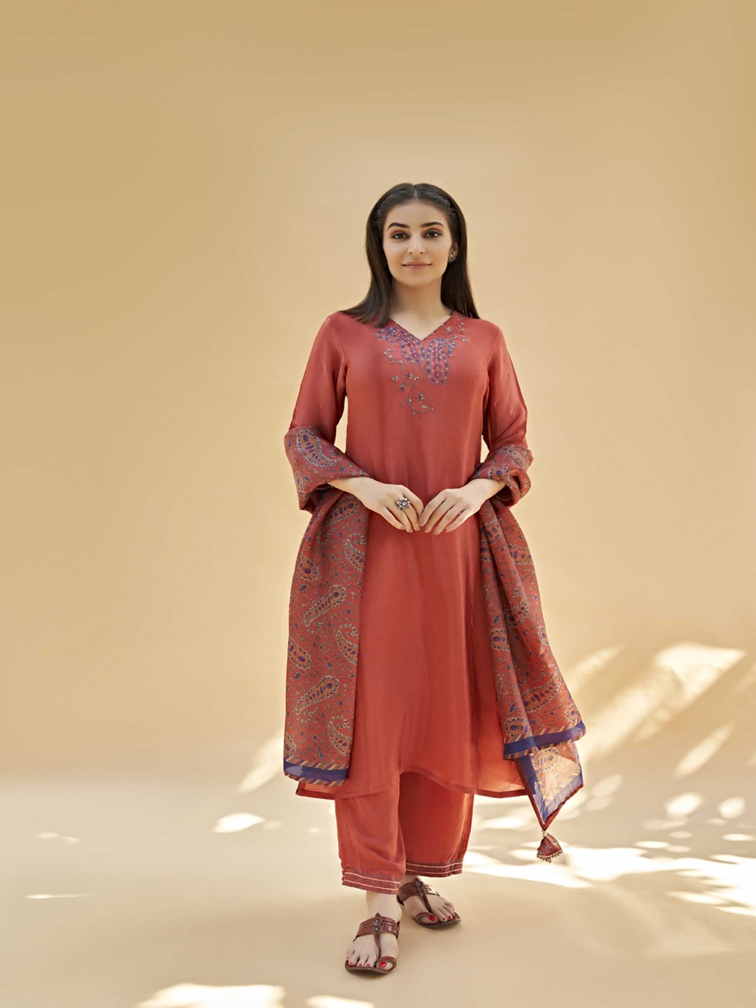 

SUKRUTI DESIGN Paisley Yoke Design V-Neck Sequinned Straight Kurta With Trouser & Dupatta, Orange