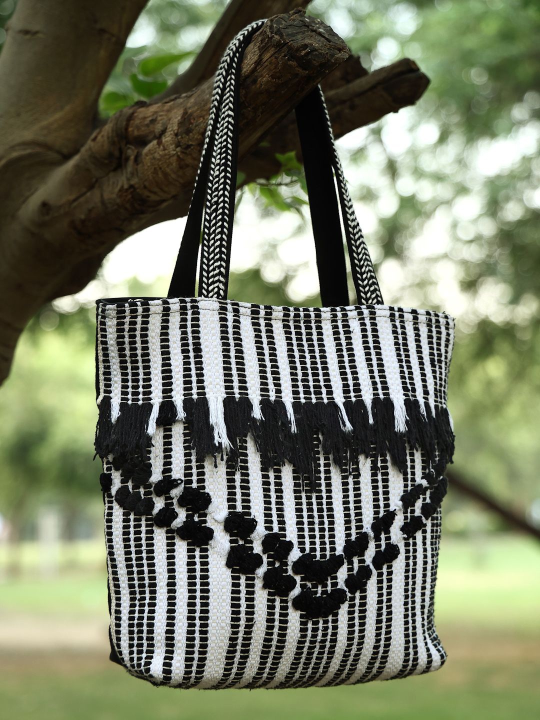 

Anekaant Striped Self Design Shopper With Fringed Cotton Dari Tote Bag, Black
