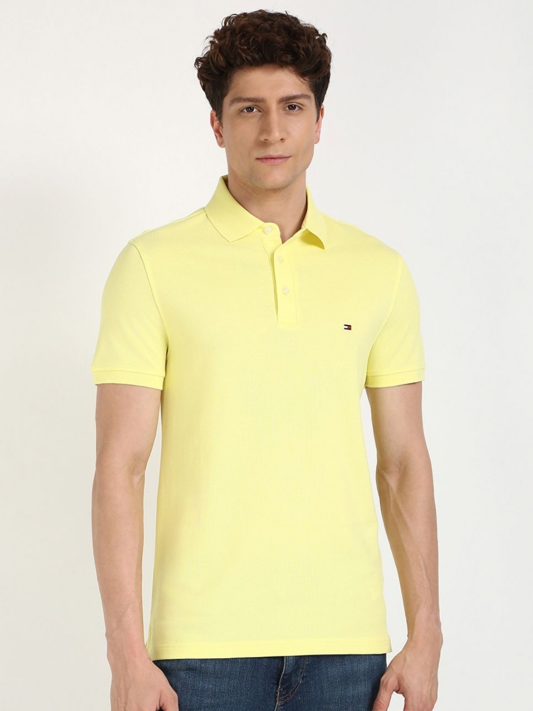 

Tommy Hilfiger Men Solid Polo Collar Organic Cotton Slim Fit T-shirt, Yellow