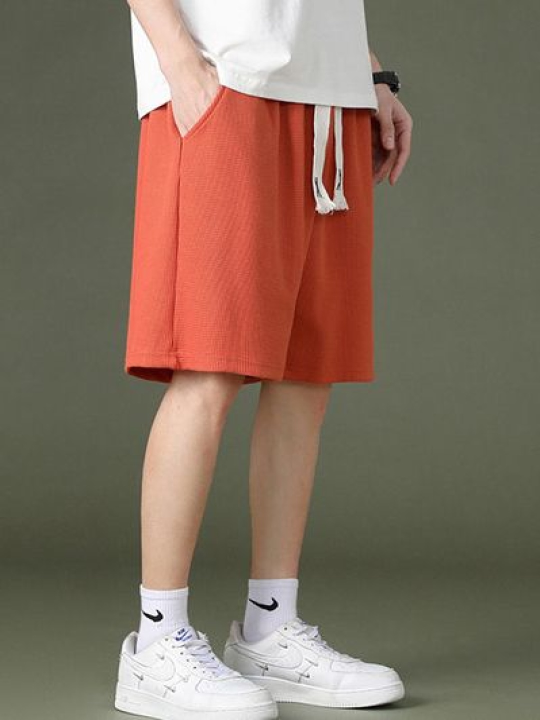 

StyleCast x Revolte Men Regular Fit Mid-Rise Shorts, Orange