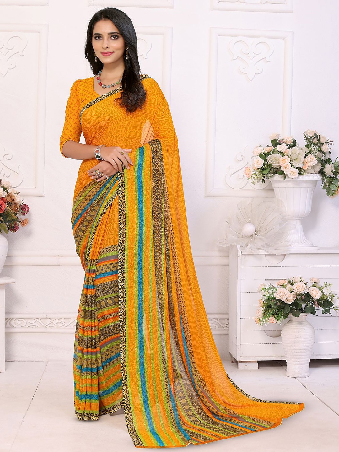 

Moda Rapido Ethnic Motifs Printed Saree, Yellow