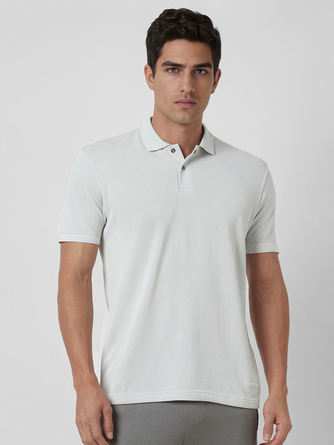 

Van Heusen Flex Men Solid Polo Collar Cotton T-shirt, White