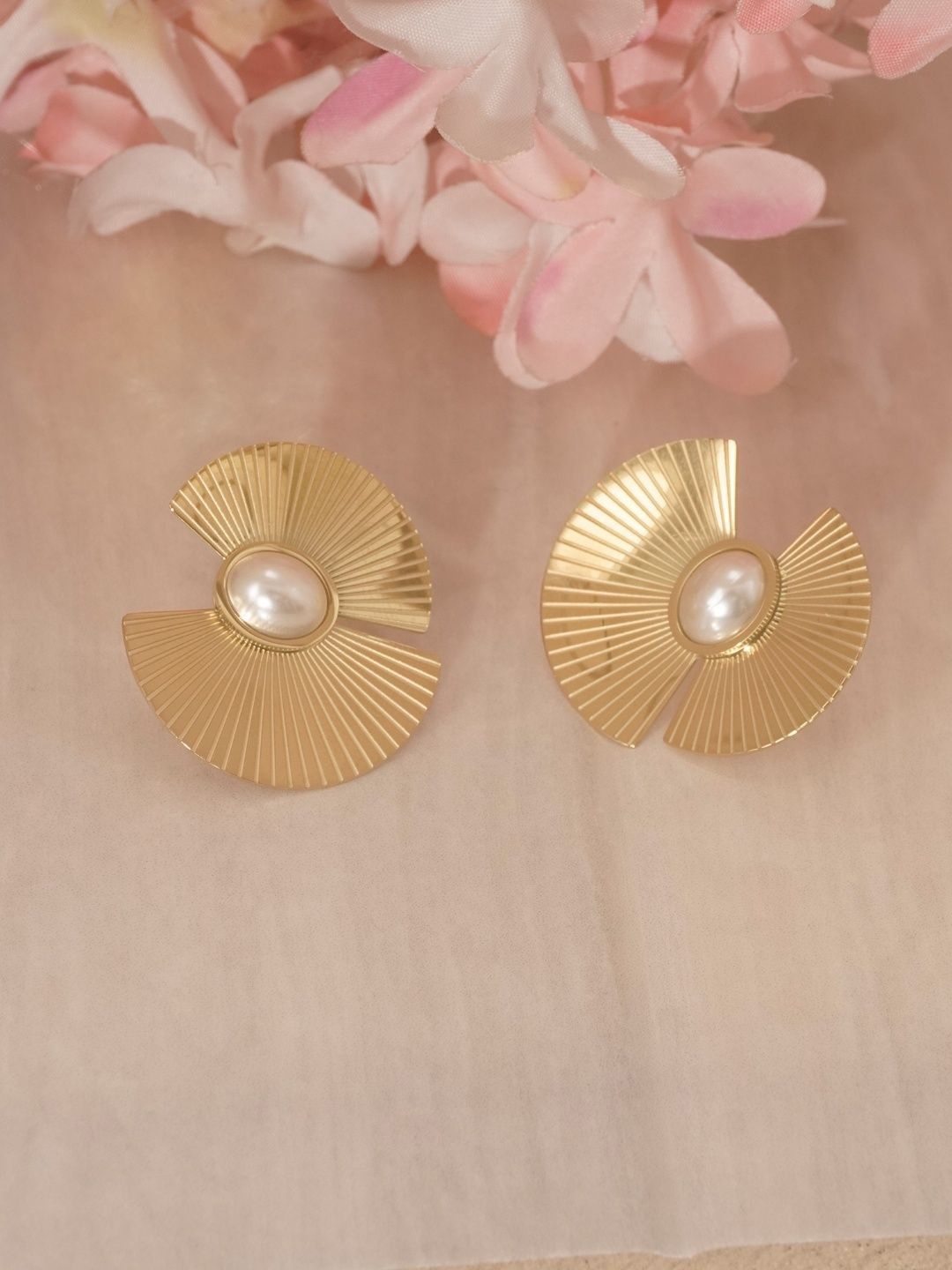 

Niscka Gold-Plated Artificial Stones Studded Contemporary Shaped Studs