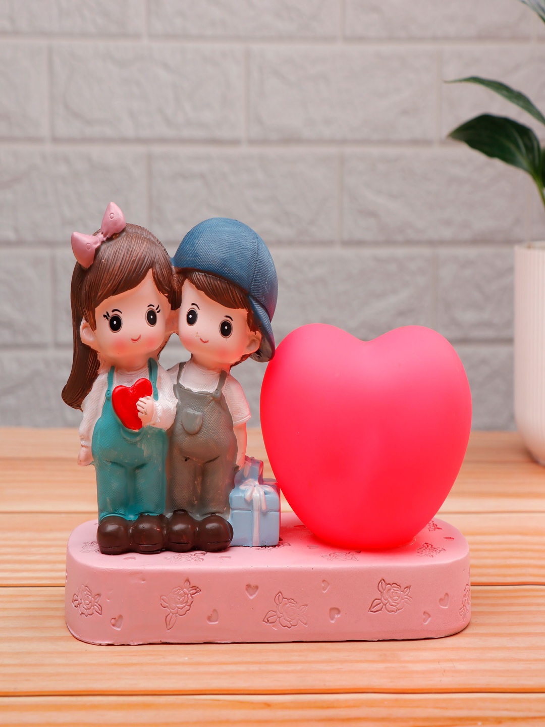 

Archies Green Heart Of Love Couple Figurine Showpiece