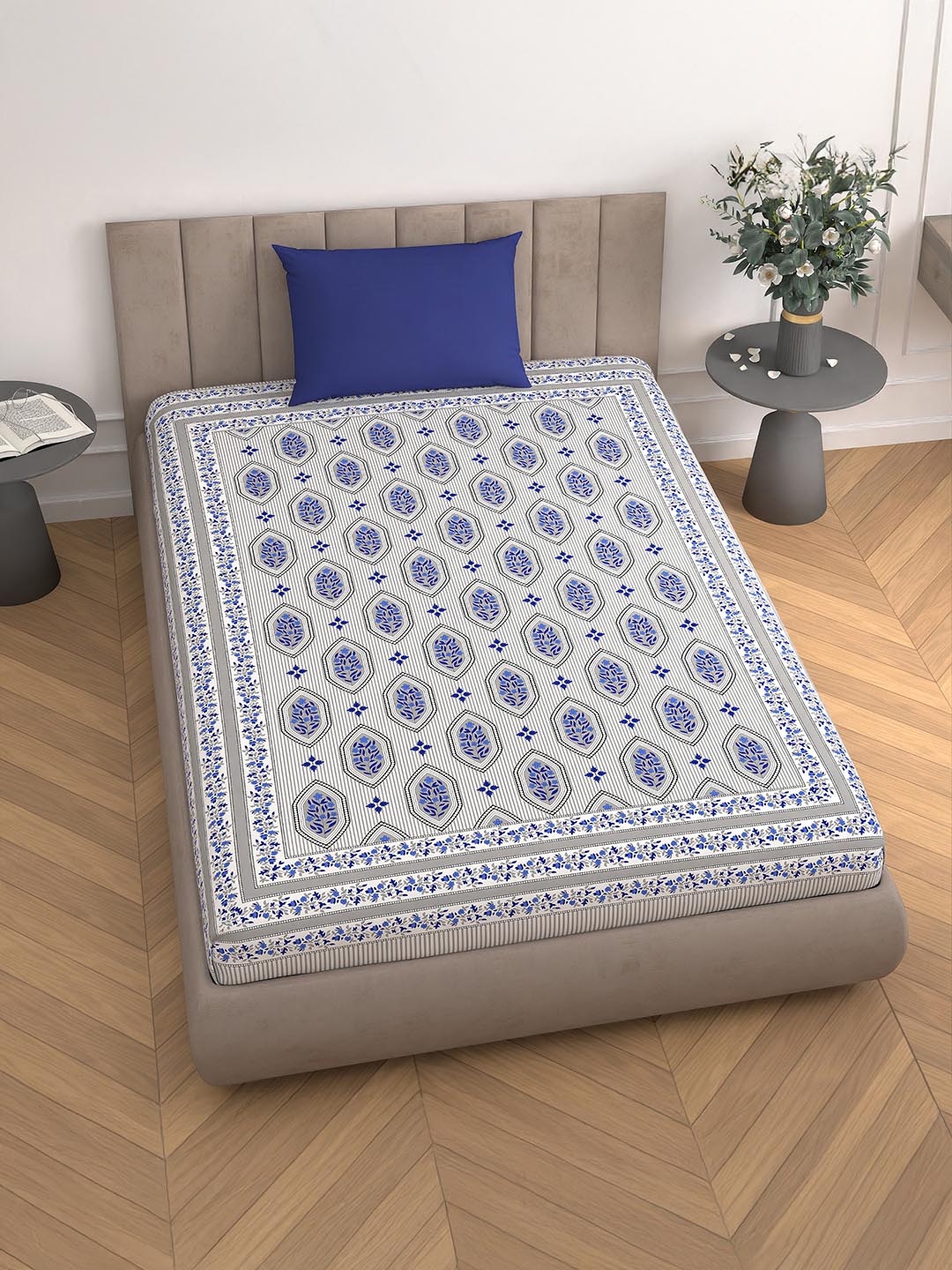 

Aura Blue & White Floral 110 TC Single Bedsheet with 1 Pillow Covers