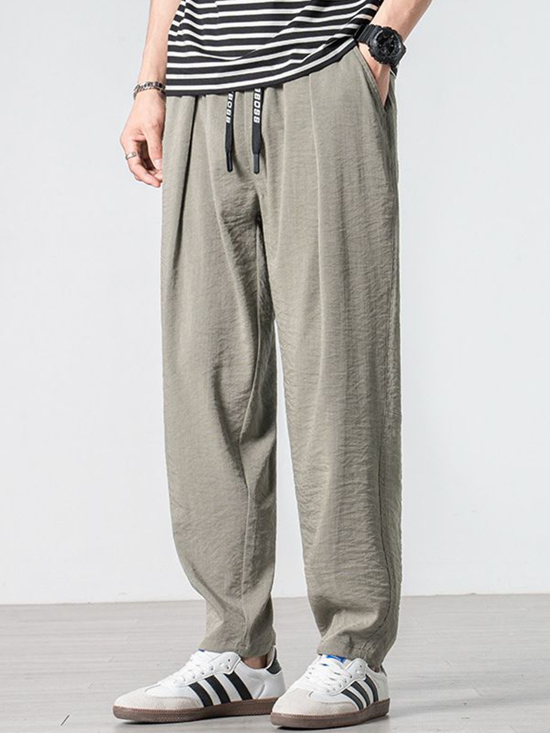 

StyleCast Men Solid Loose Fit Trousers, Grey