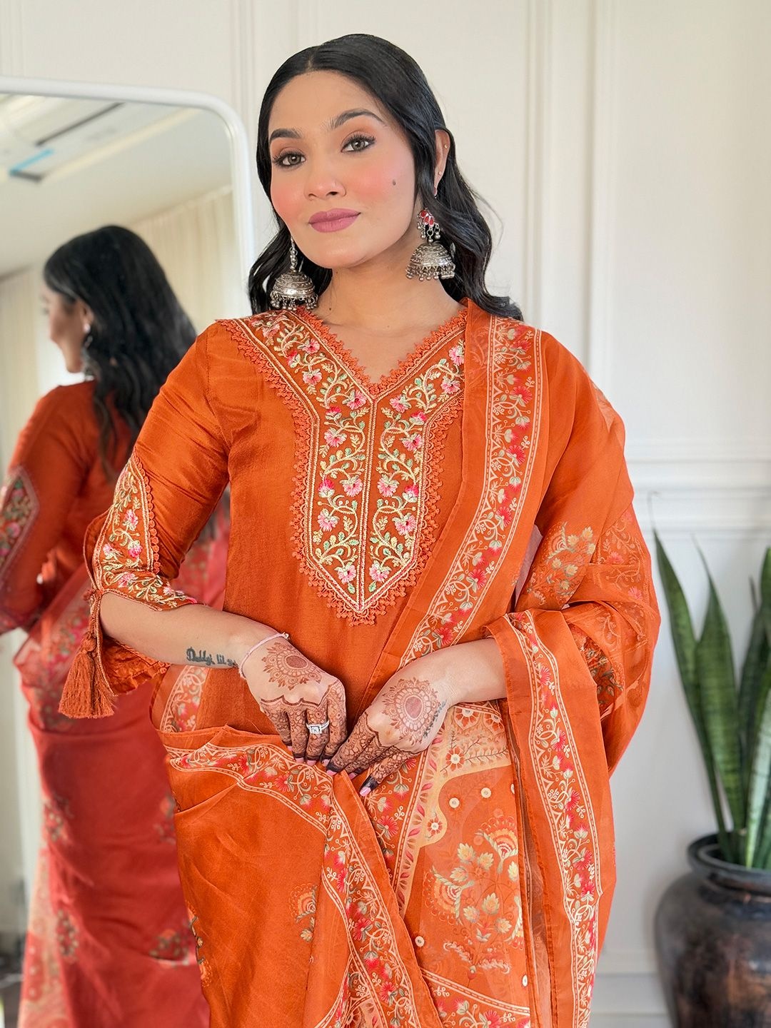 

KALINI Floral Embroidered V-Neck Straight Kurta With Trouser And Dupatta, Rust