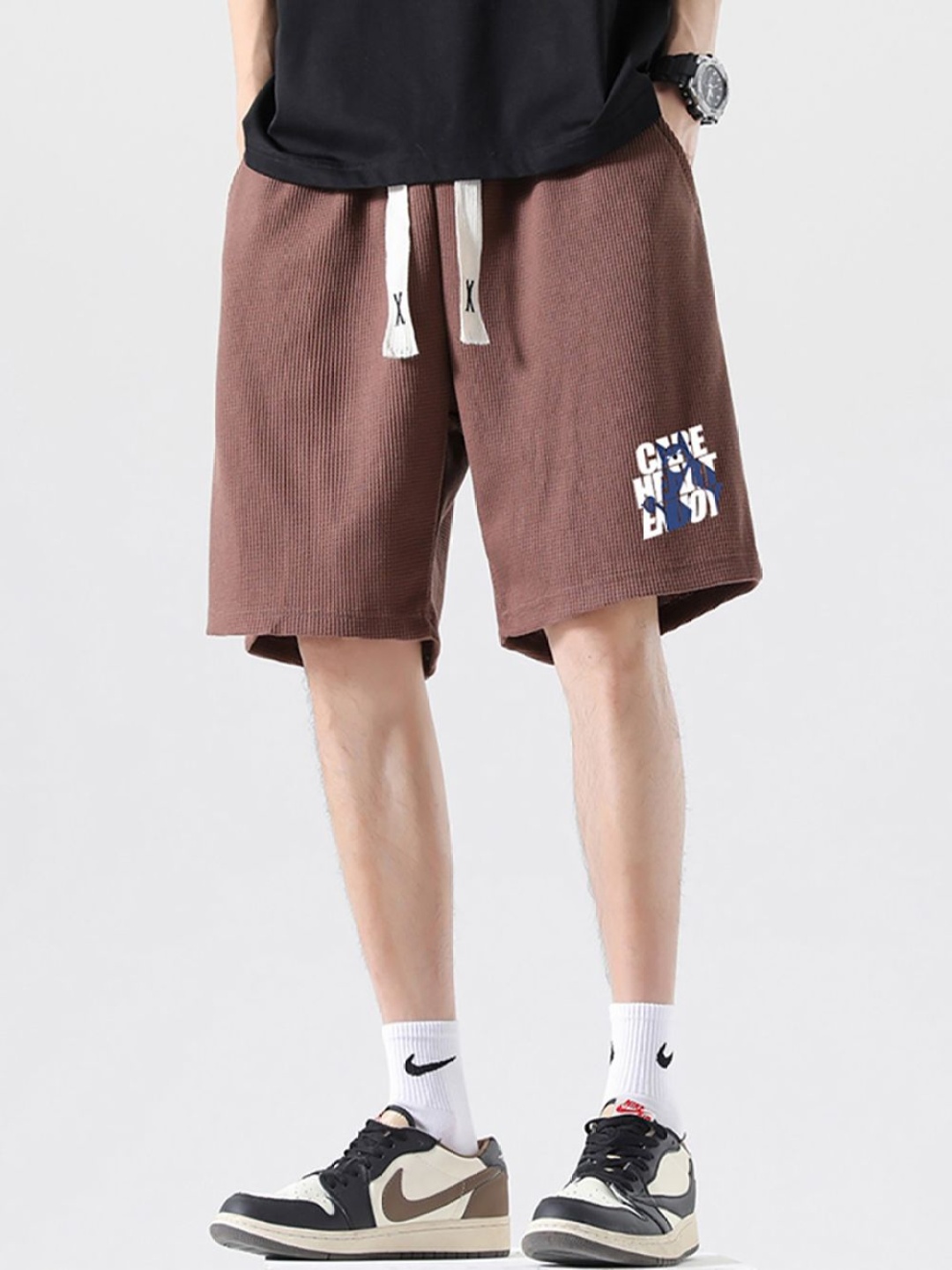 

StyleCast x Revolte Men Printed Mid-Rise Shorts, Coffee brown