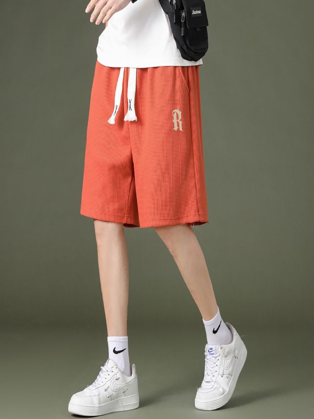 

StyleCast x Revolte Men Mid-Rise Regular Fit Shorts, Orange
