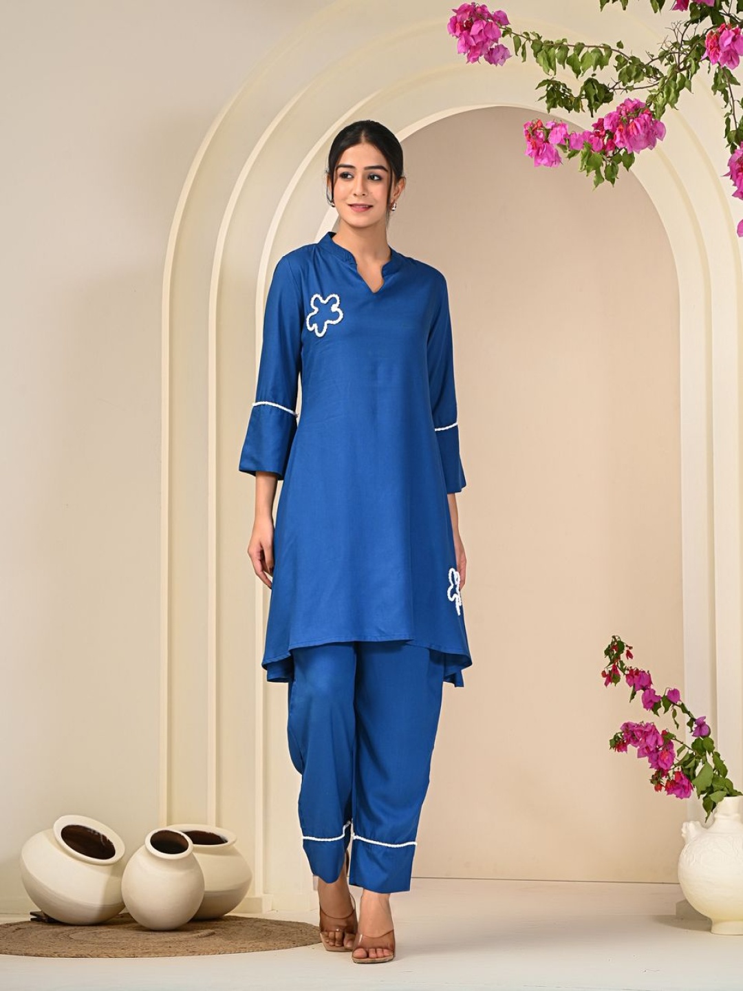 

Moda Rapido Women Embroidered Regular Thread Work Kurti with Trousers, Blue