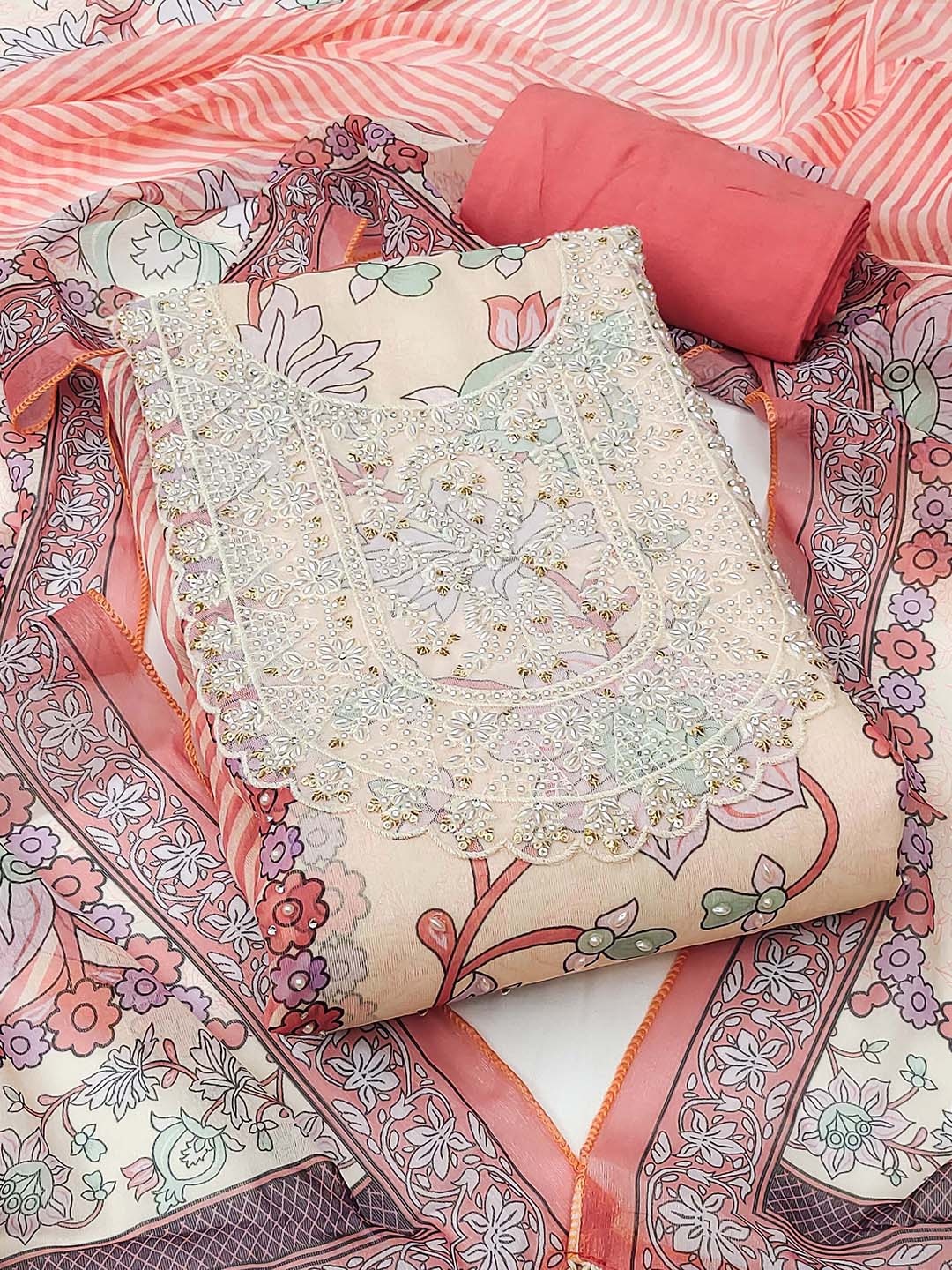 

Maroosh Floral Embellished Unstitched Dress Material, Peach