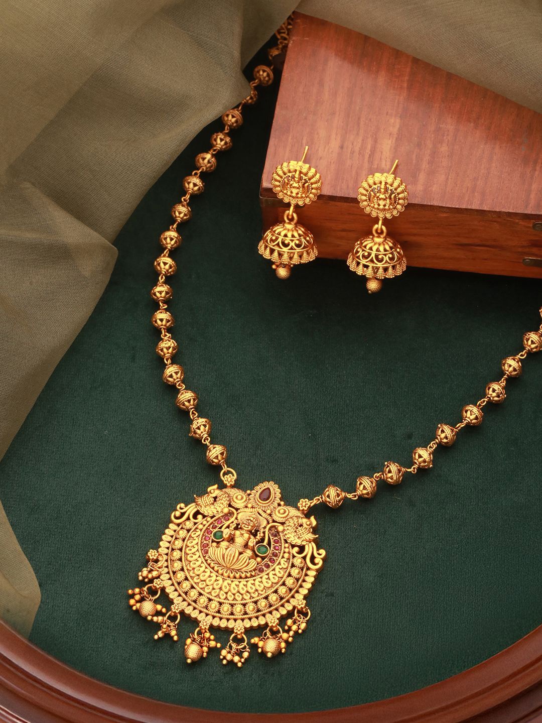 

Saraf RS Jewellery Gold Plated AD Studded lakshmiji Temple Necklace & Earrings