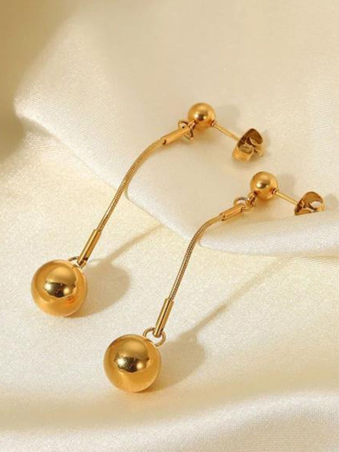 

Niscka Gold-Plated contemporary Shaped Drop Earrings