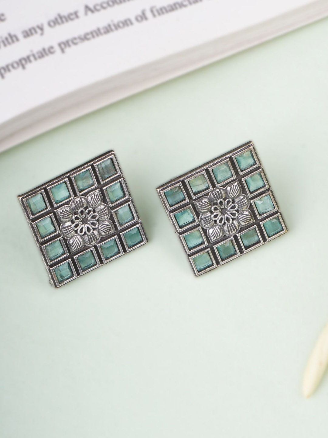 

Adwitiya Silver-Plated Artificial Stones Studded Square Shaped Oxidised Studs