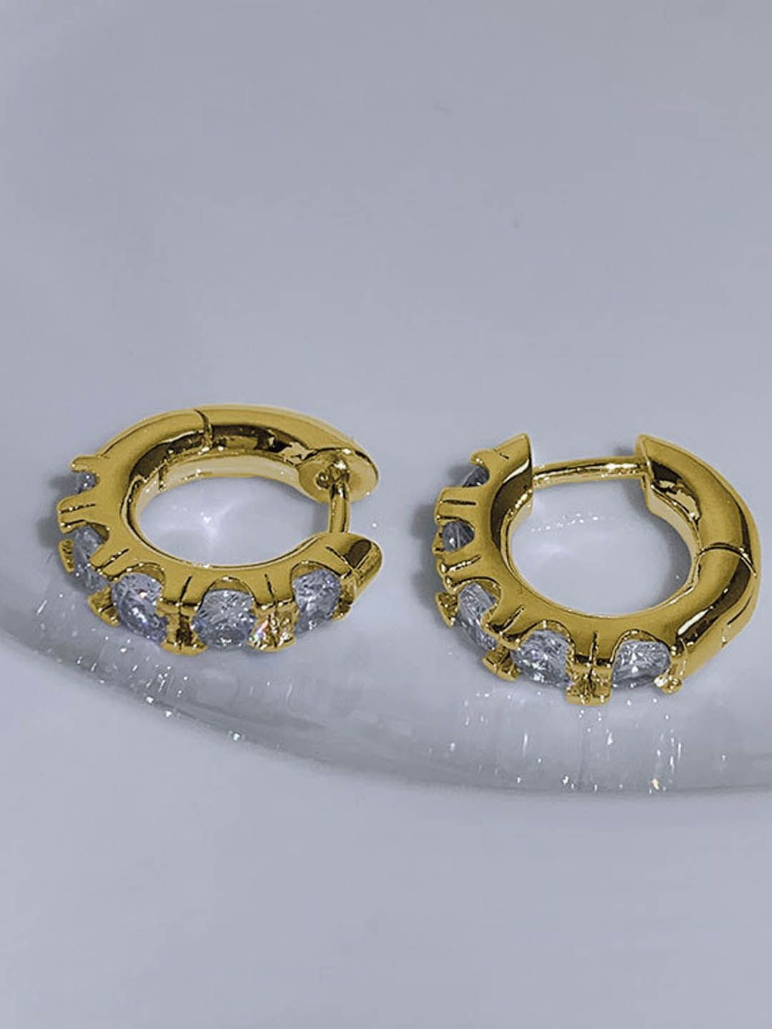 

StyleCast Gold-Toned Artificial Stones Studded Contemporary Hoop Earrings