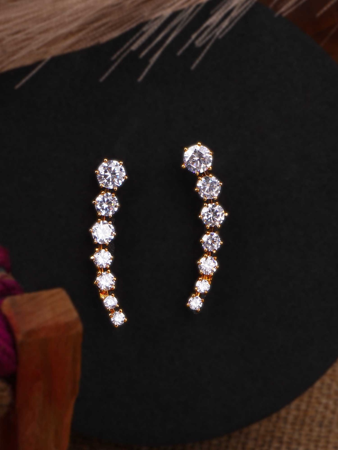 

Adwitiya Gold-Plated Artificial Stones Studded Contemporary Shaped Studs