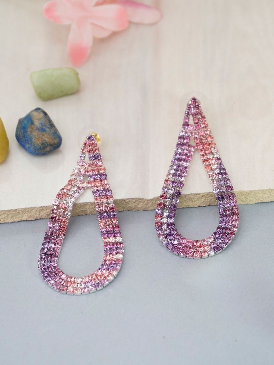 

Niscka Rhodium-Plated American Diamond Studded Teardrop Shaped Drop Earrings, Pink