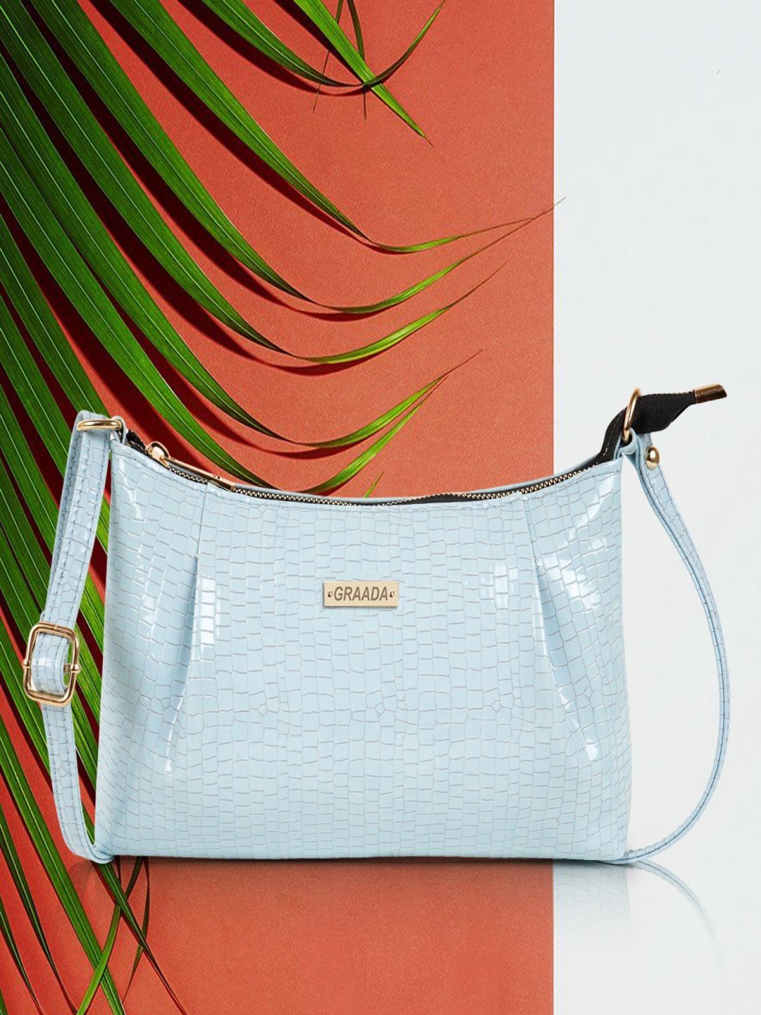 

GRAADA Women Textured Structured Leather Sling Bag, Blue