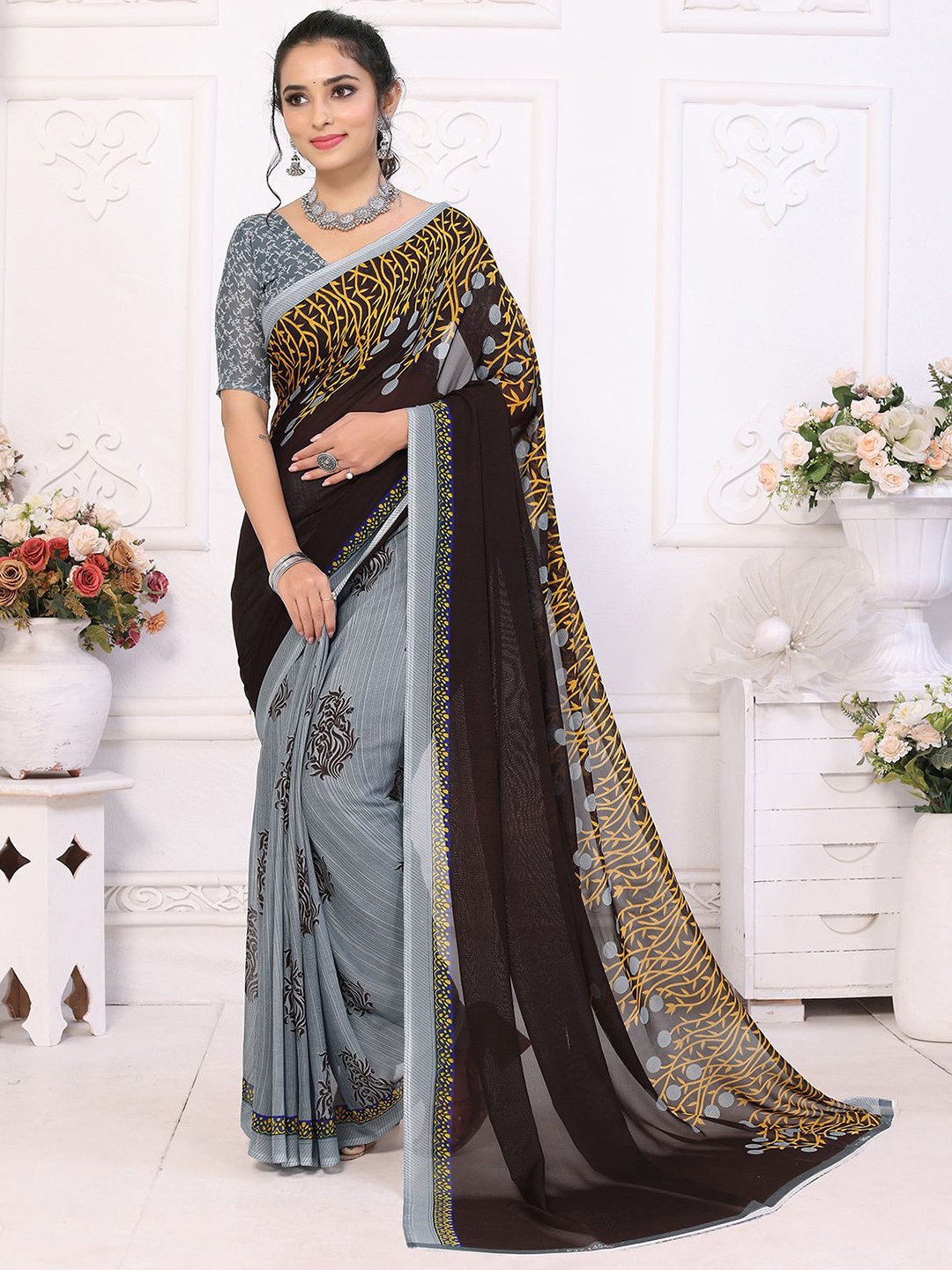 

Moda Rapido Printed Saree With Unstiched Blouse Piece, Brown