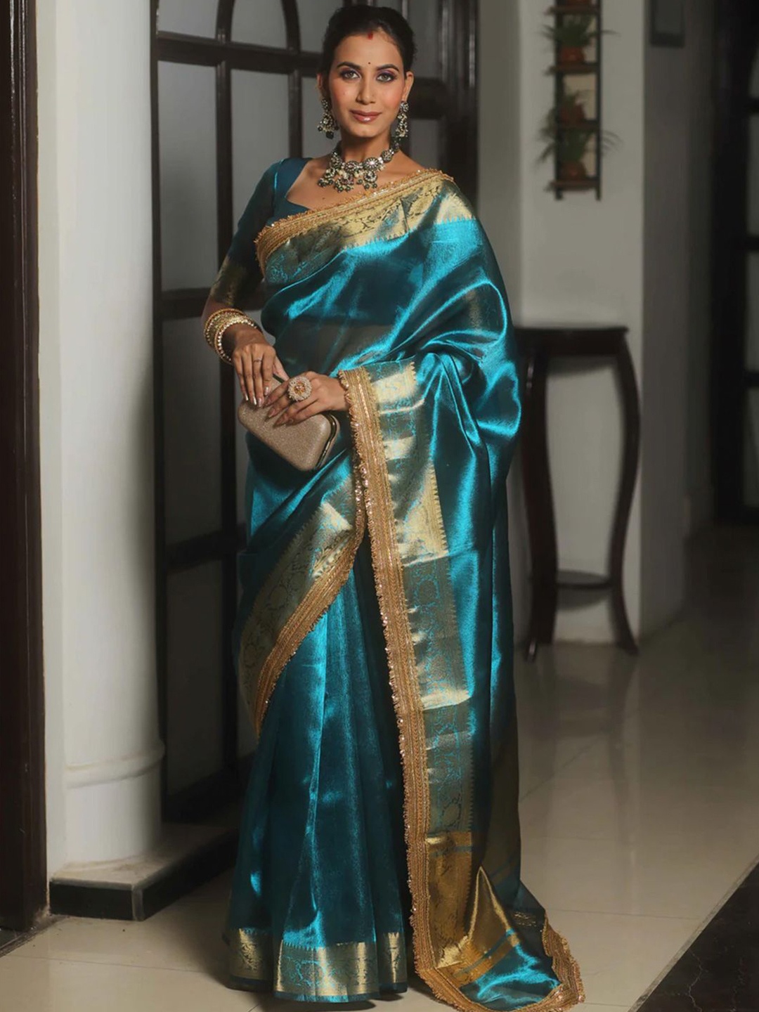 

Saree mall Ethnic Motifs Zari Tissue Sarees with Matching Blouse, Teal