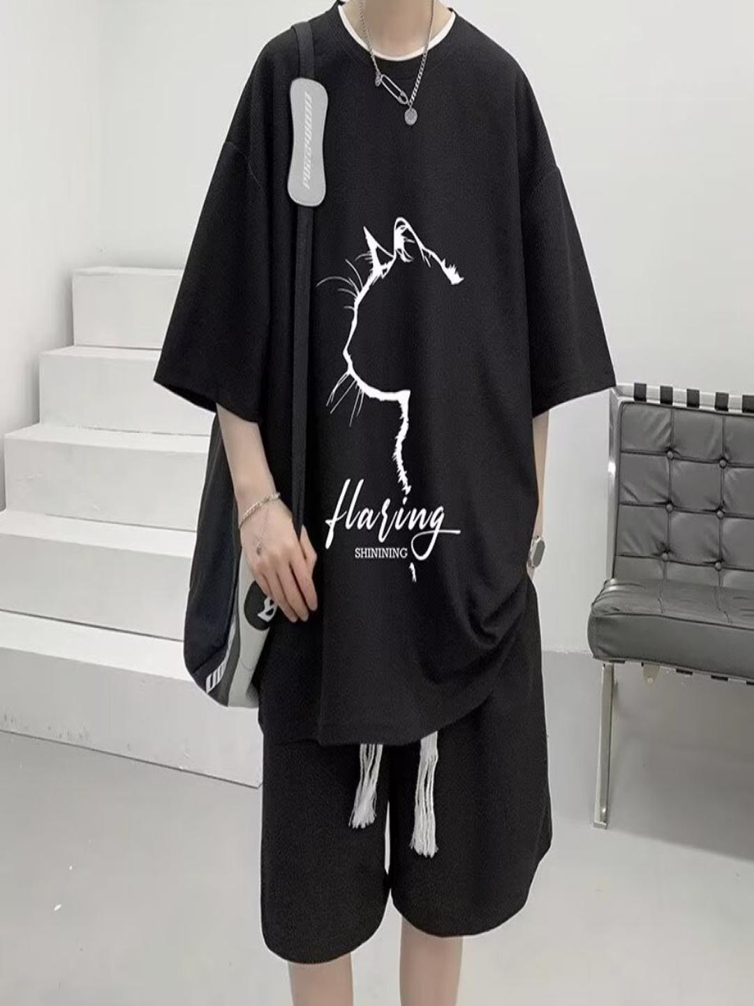 

StyleCast Men Graphic Printed Round Neck Silk Oversized T-shirt, Black