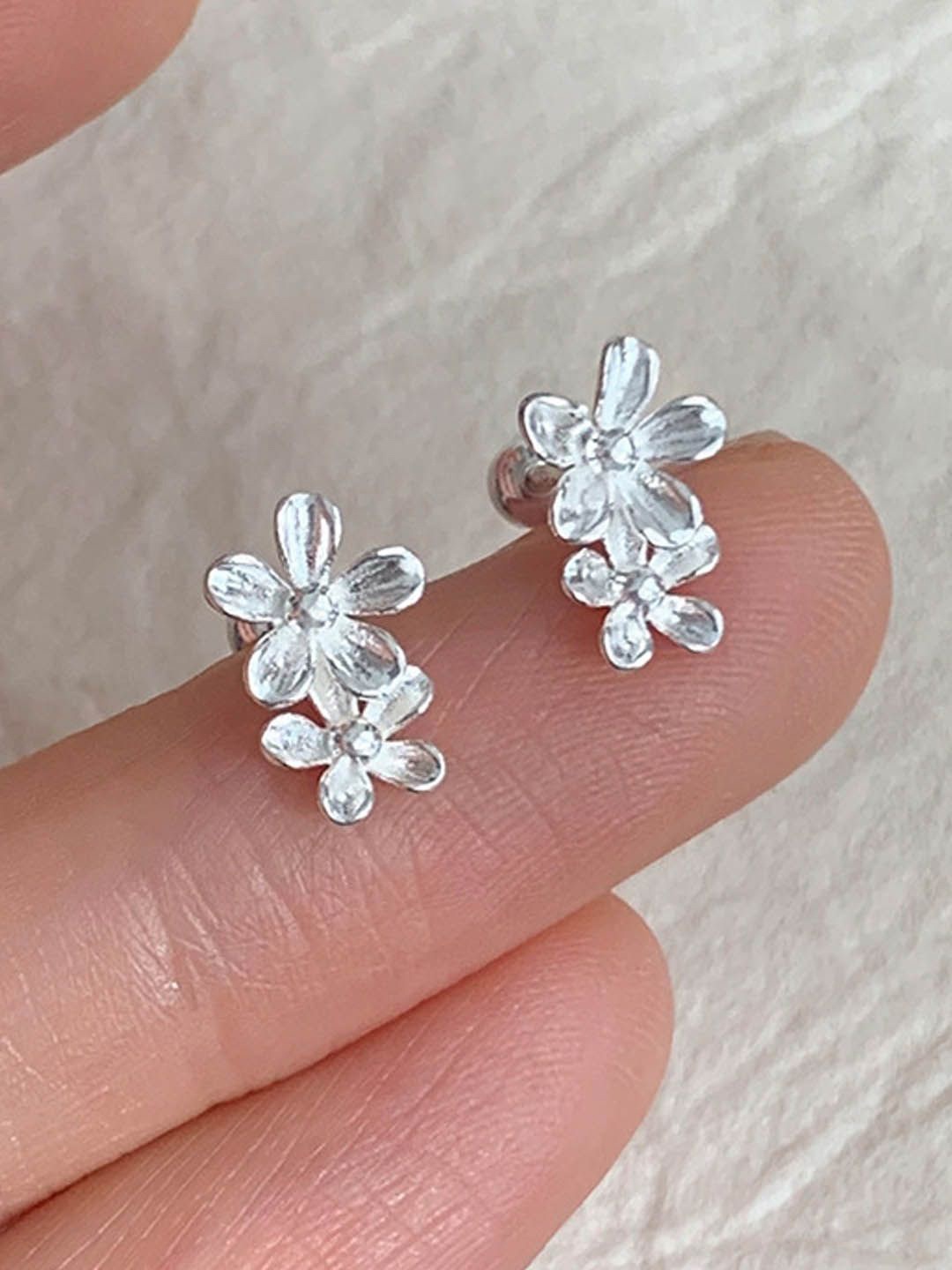 

StyleCast Silver-Toned Floral Studs