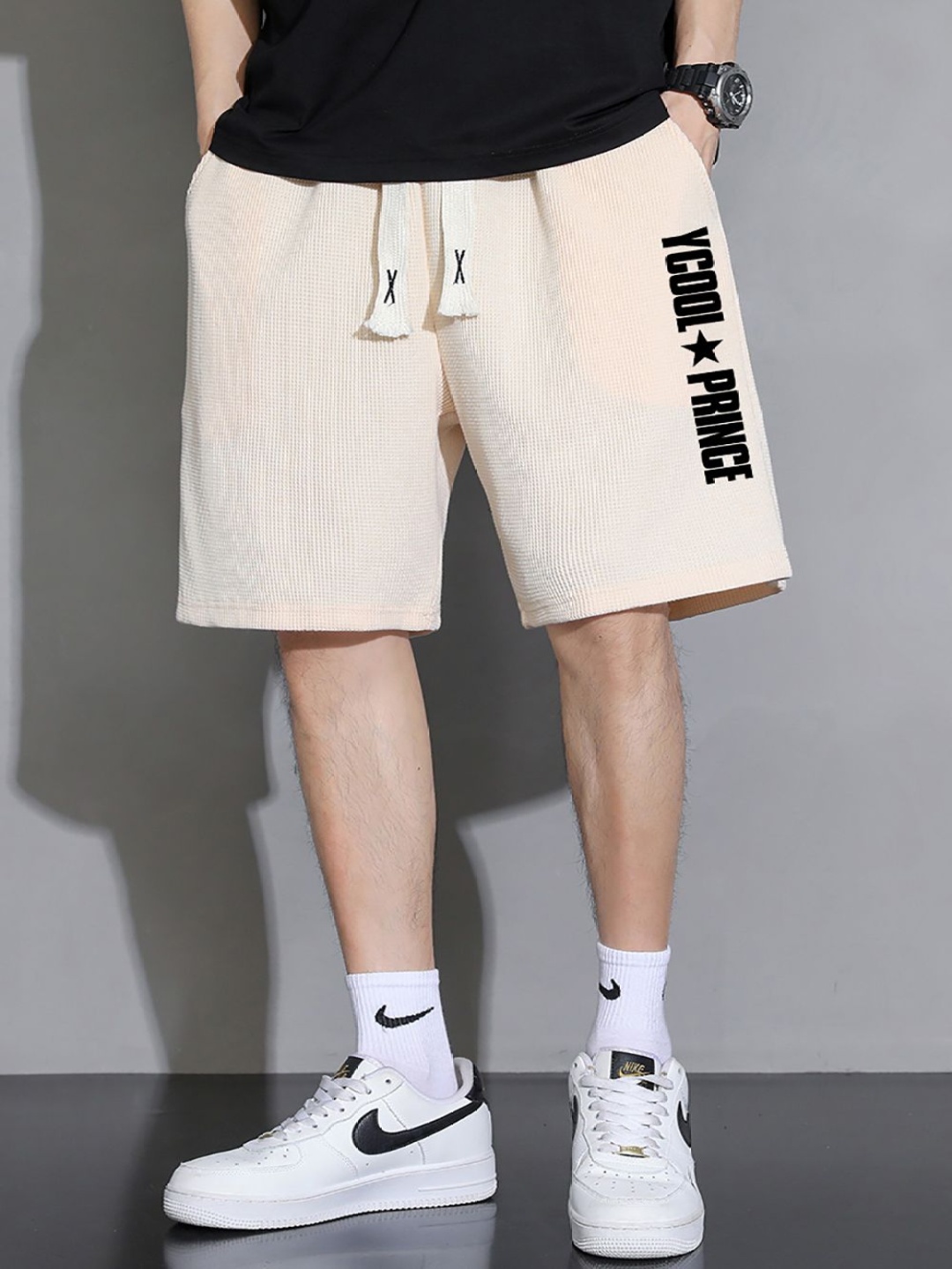 

StyleCast x Revolte Men Typography Printed Regular Fit Mid-Rise Shorts, Beige