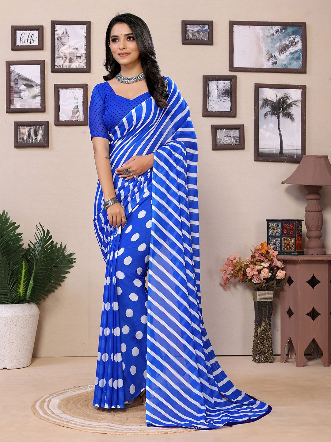 

Moda Rapido Striped Printed Saree With Unstiched Blouse Piece, Blue