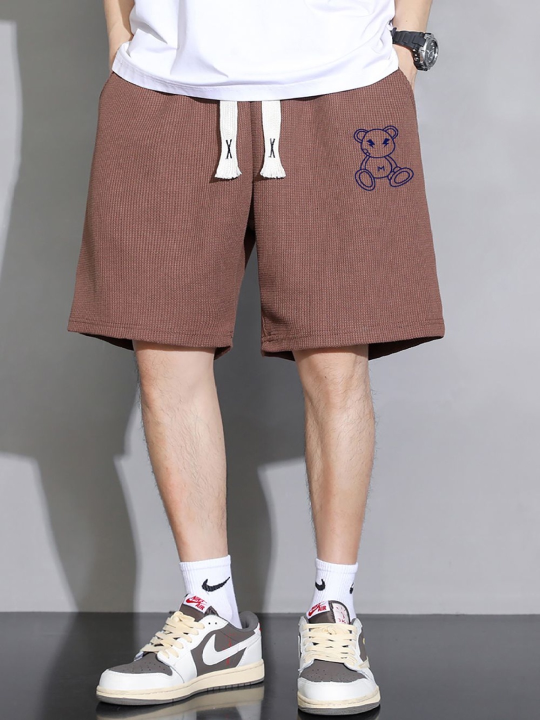 

StyleCast x Revolte Men Printed Regular Fit Mid-Rise Shorts, Brown