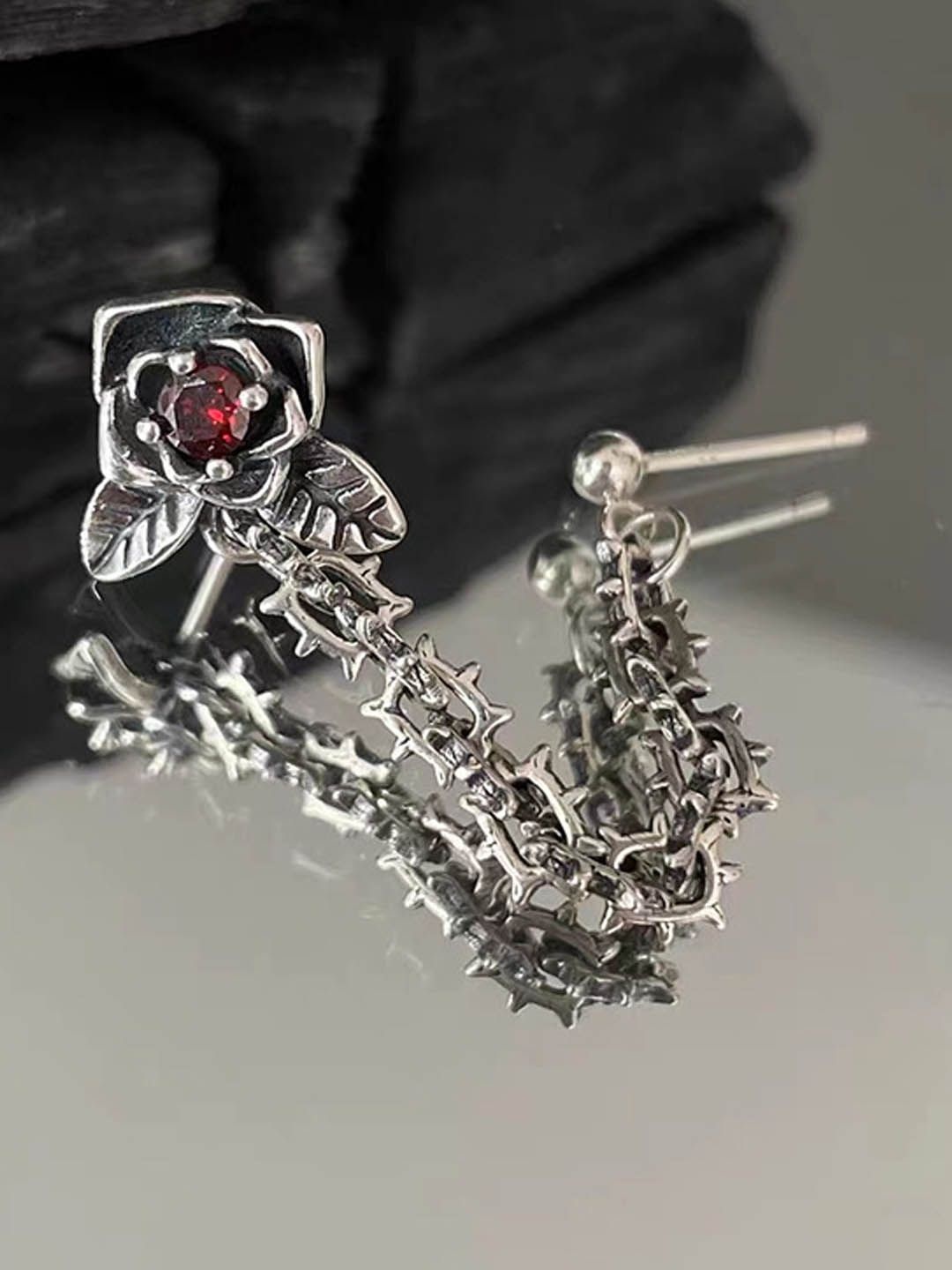 

StyleCast Elegant Silver-Toned Artificial Stones Studded Floral Shaped Drop Earrings