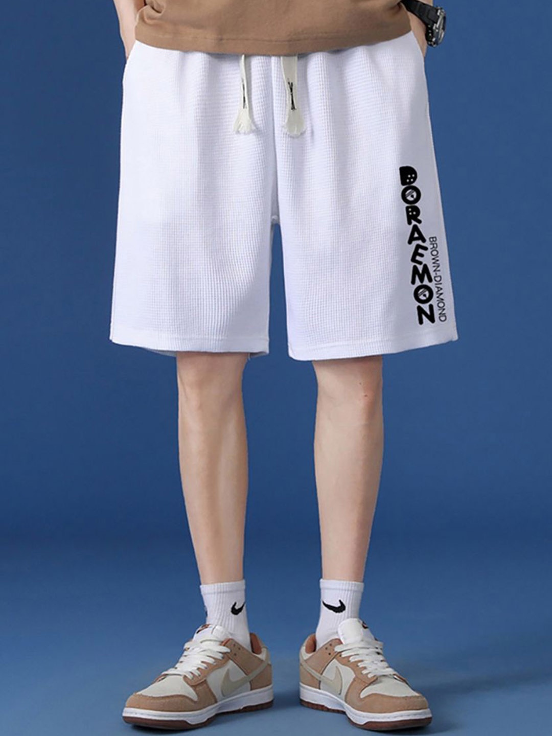 

StyleCast x Revolte Men Printed Regular Fit Mid-Rise Shorts, White