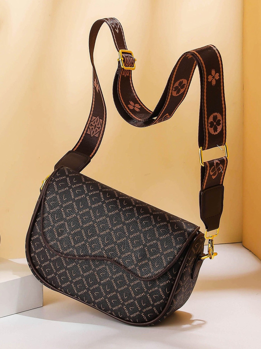 

Diva Dale Textured PU Structured Sling Bag with Cut Work, Brown
