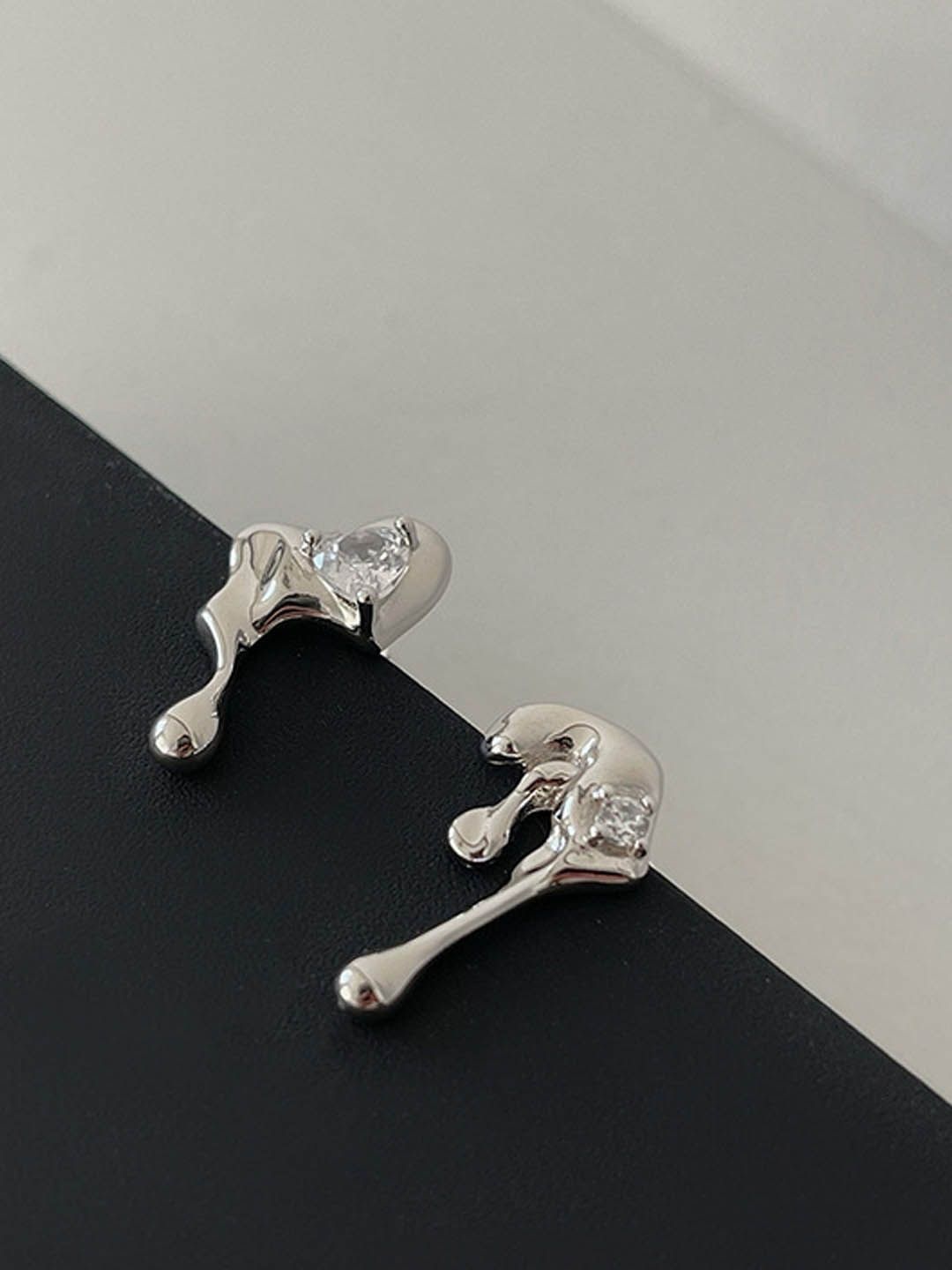 

StyleCast Elegant Silver-Toned Contemporary Shaped Studs