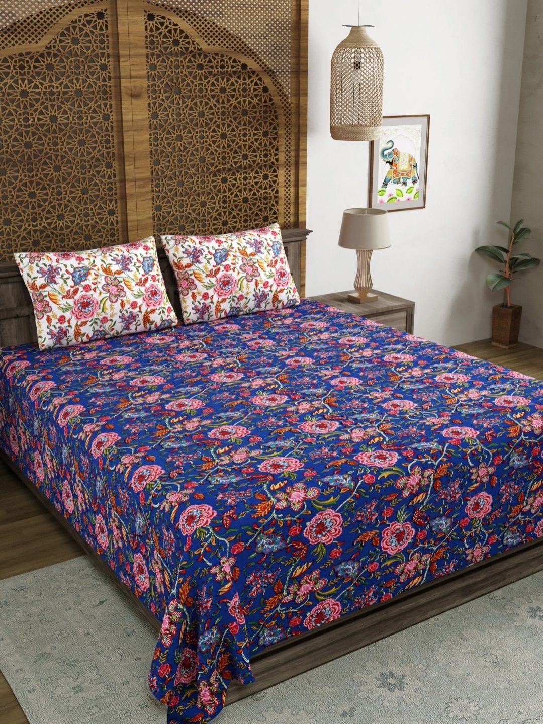 

Myntra Elegant Homes Blue And Pink Printed 210 TC King Bedsheet Set 2.64 m x 2.64 m