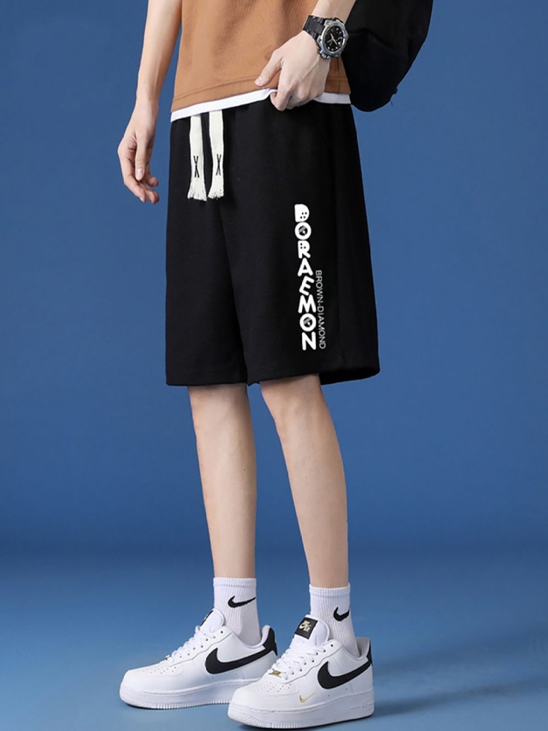 

StyleCast x Revolte Men Graphic Printed Regular Shorts, Black